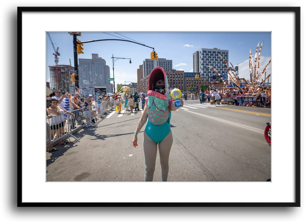 NYC Mermaid Parade Fish Gun framed print