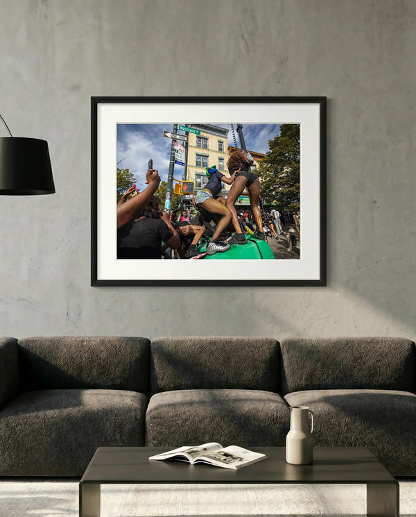 NYC J'Ouvert Twerking, Nostrand Avenue — minimalist close-up framed print mockup, Good Beans NYC.