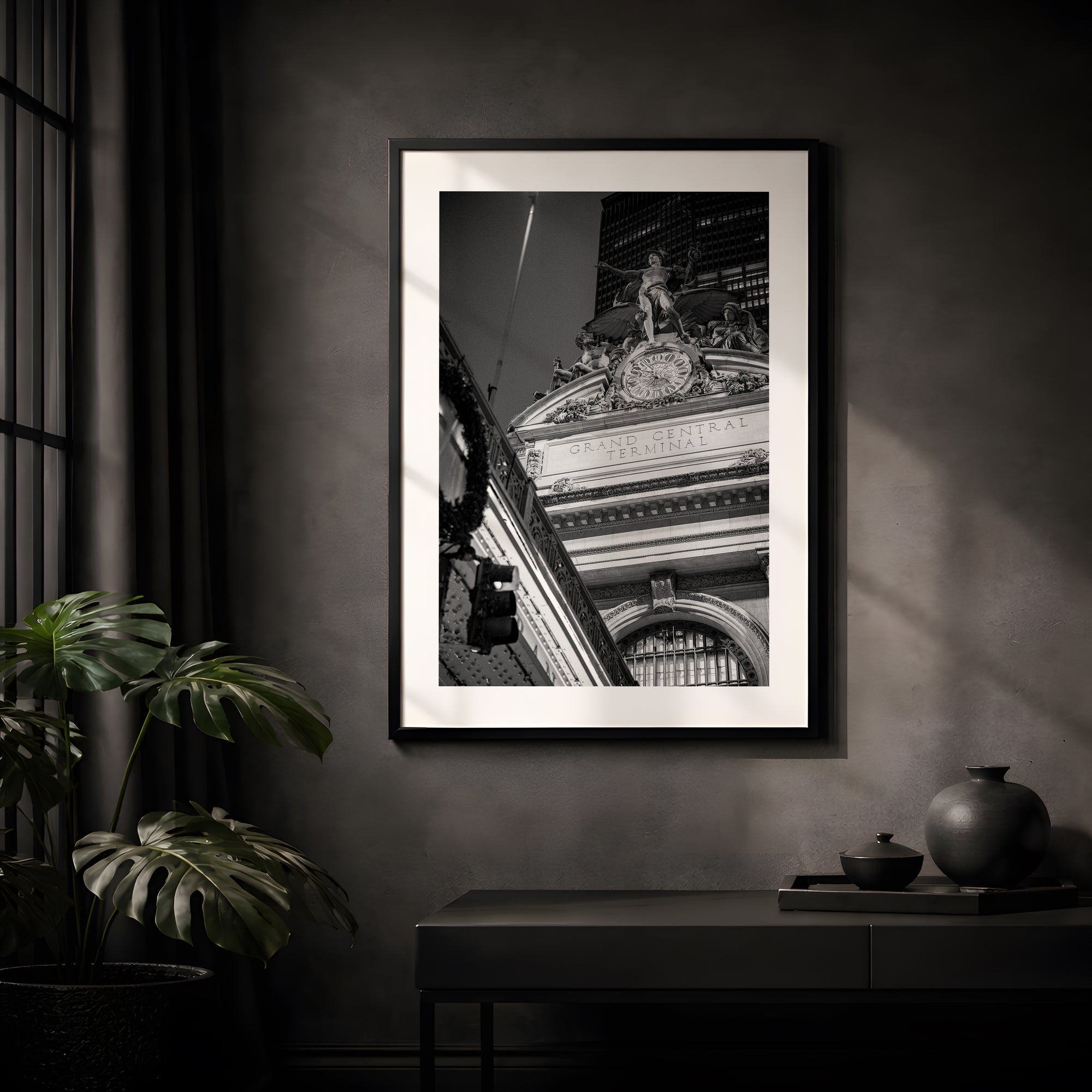 NYC Grand Central from the Right, Mercury Statue framed in black above a terracotta velvet sofa, gray plaster wall — Good Beans NYC.