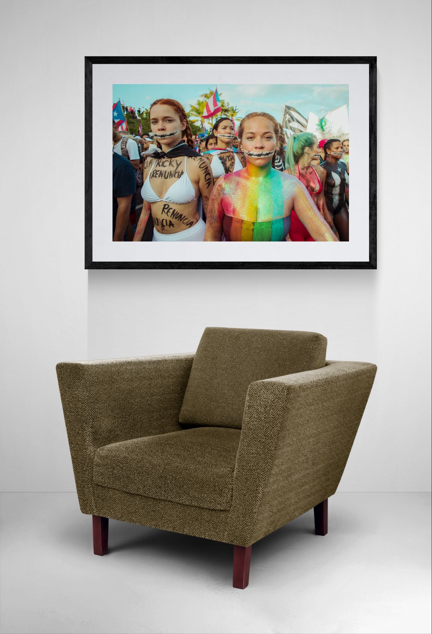 Puerto Rico Renuncia Body Paint Women, San Juan framed in black above a terracotta velvet sofa, gray plaster wall — Good Beans NYC.