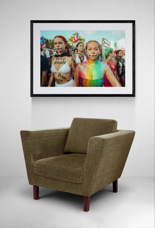 Puerto Rico Renuncia Body Paint Women, San Juan framed in black above a terracotta velvet sofa, gray plaster wall — Good Beans NYC.