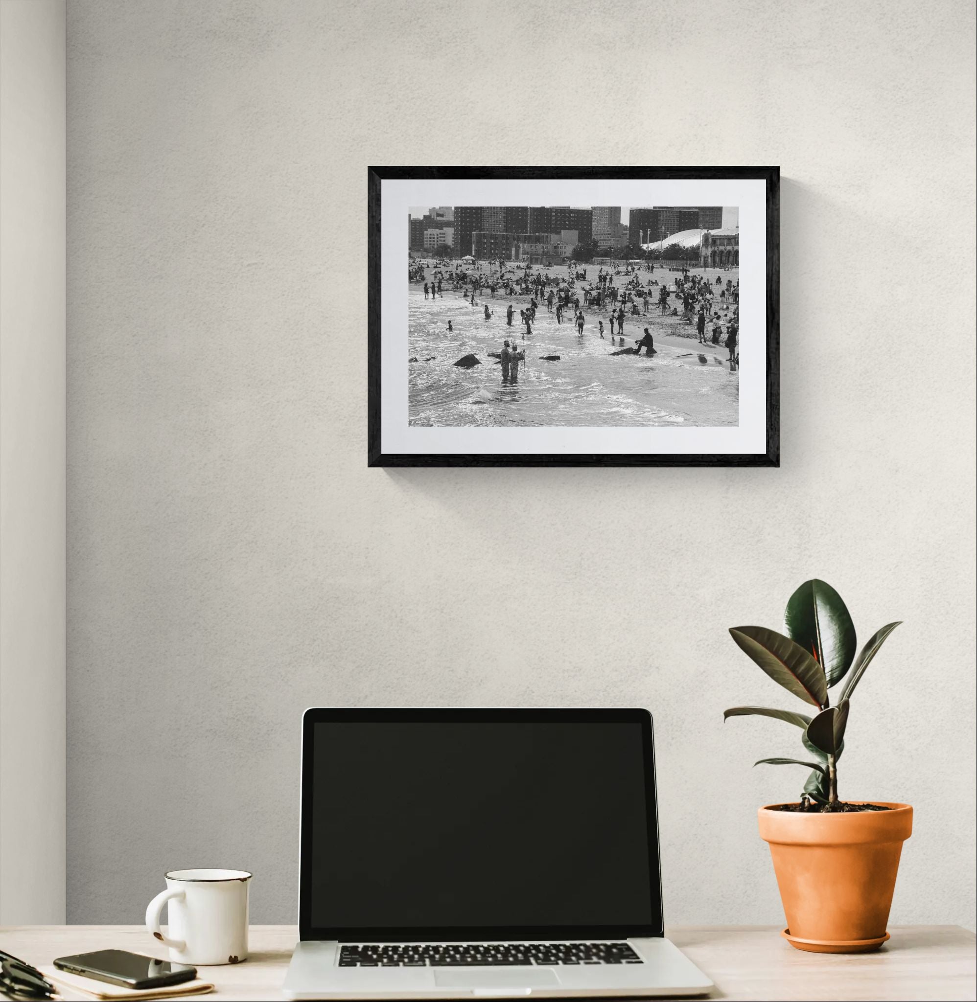NYC Mermaid Parade Sea Men, Coney Island Surf framed in black above a terracotta velvet sofa, gray plaster wall — Good Beans NYC.