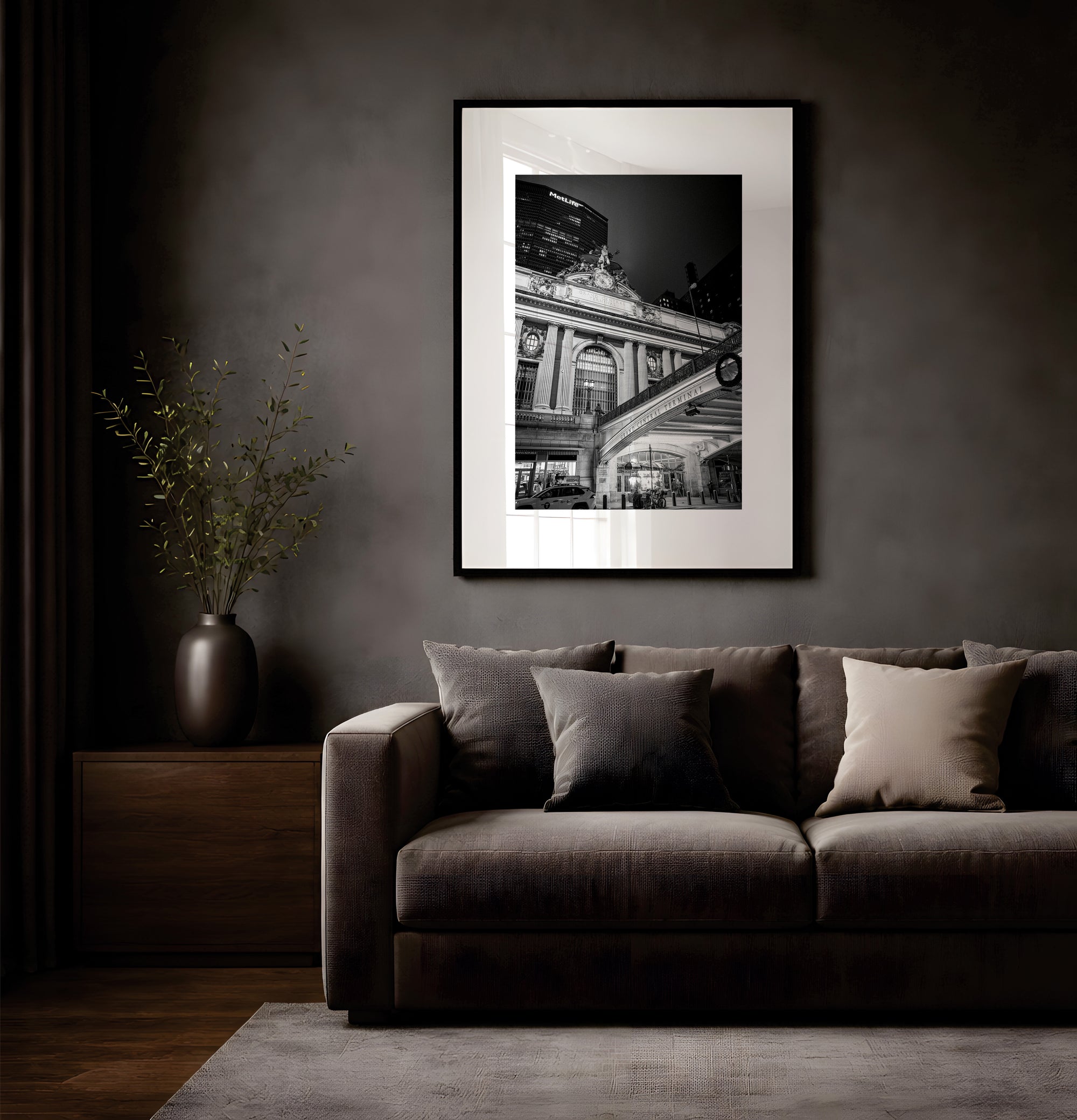 NYC Grand Central from the Left, 42nd Street framed in black on a gallery wall with a viewer in a straw hat in front — Good Beans NYC.