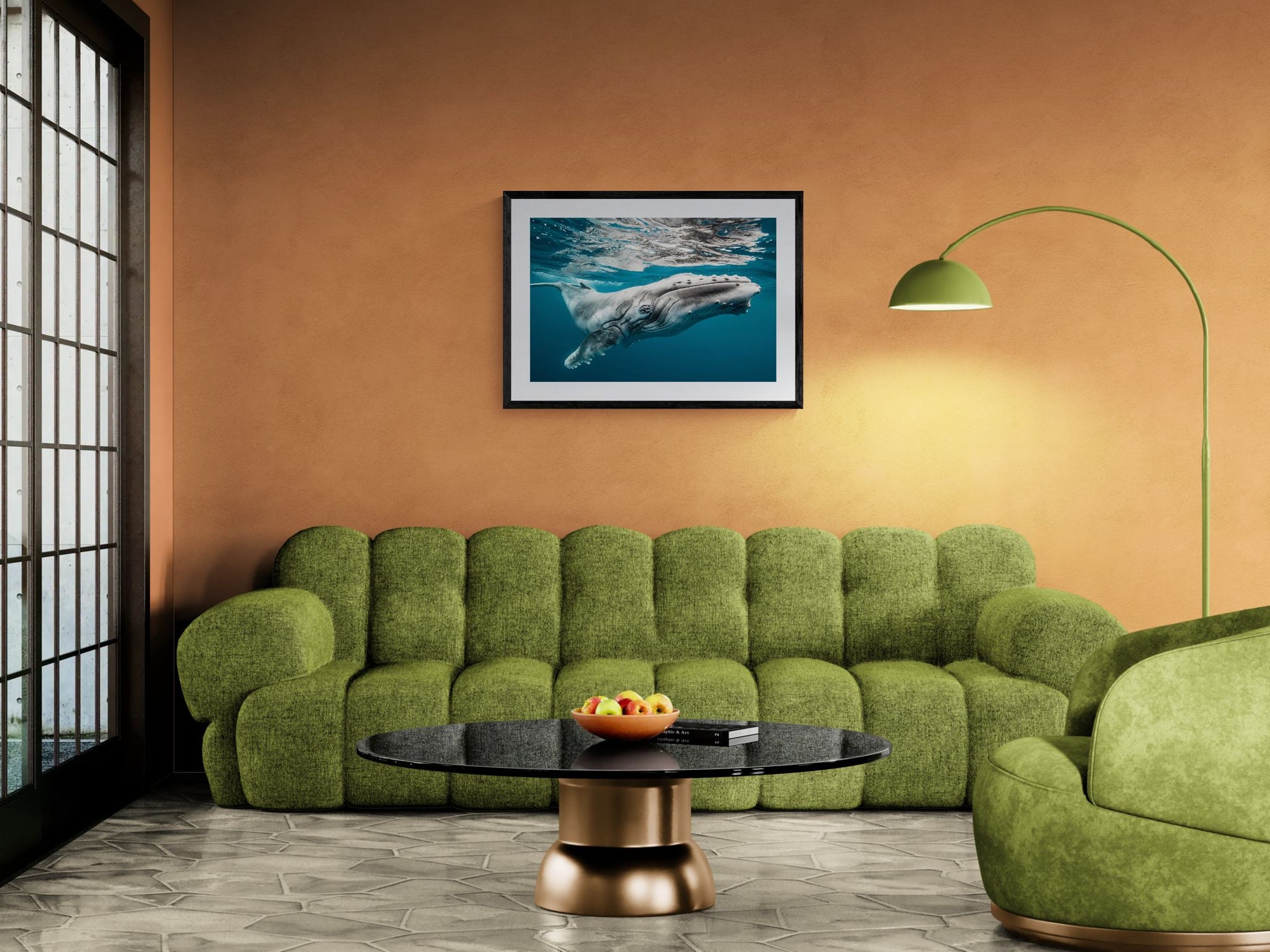 Baby Humpback Whale off the Coast of Tonga, Photo by Karim Iliya framed in black on a gallery wall with a viewer in a straw hat in front — Good Beans NYC.