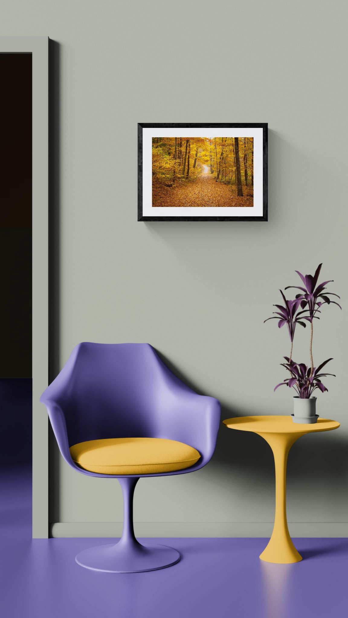 NY Fall Forest, Hudson Valley — New Paltz framed in black on a gallery wall with a side-profile viewer in a dark coat — Good Beans NYC.