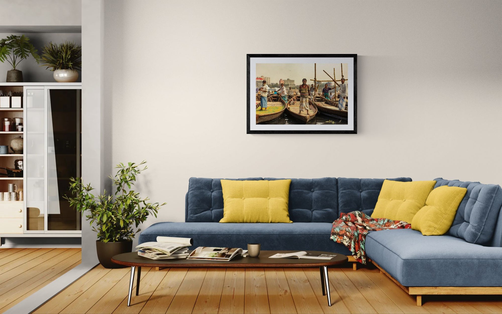 Dhaka Boat Men, Buriganga River framed in black on a gallery wall with a viewer in a straw hat in front — Good Beans NYC.