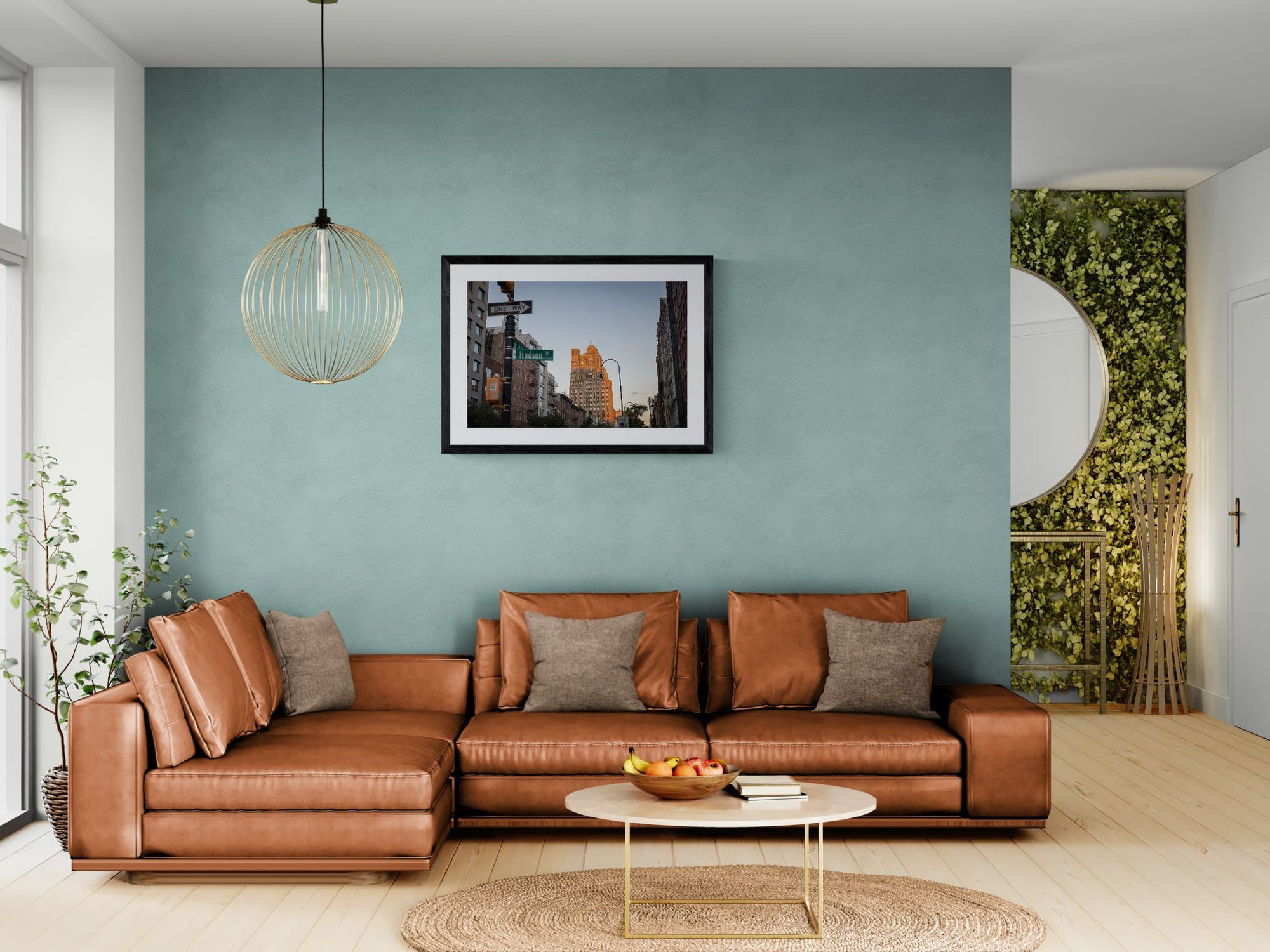 NYC Hudson Street Sunset, West Village framed in black above a terracotta velvet sofa, gray plaster wall — Good Beans NYC.