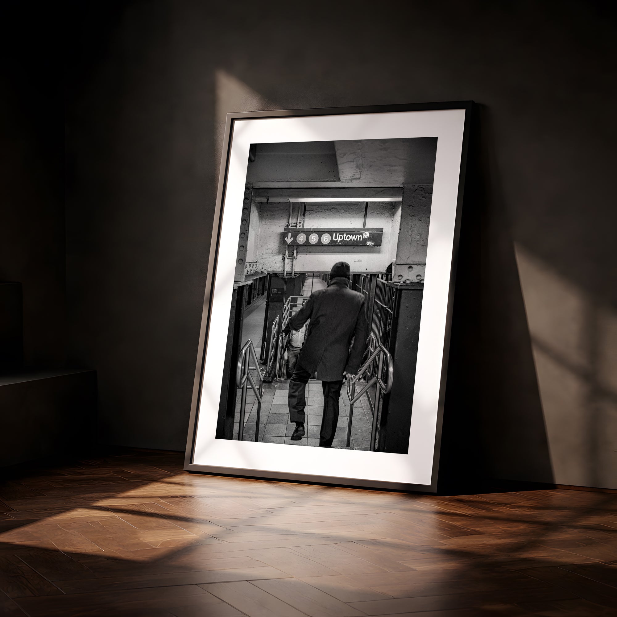 NYC Subway 456 Man Rushing, Portals Series framed in black on a gallery wall with a viewer in a straw hat in front — Good Beans NYC.