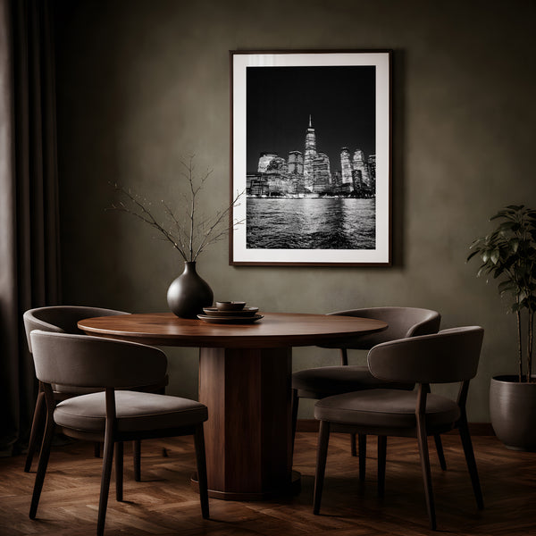 NYC Freedom Tower from the Hudson, Manhattan framed in black above a terracotta velvet sofa, gray plaster wall — Good Beans NYC.