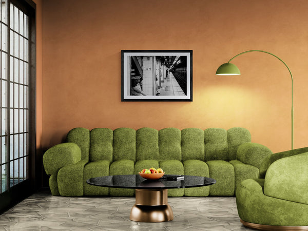 NYC Subway 42nd Street Phones, Portals Series framed in black above a terracotta velvet sofa, gray plaster wall — Good Beans NYC.