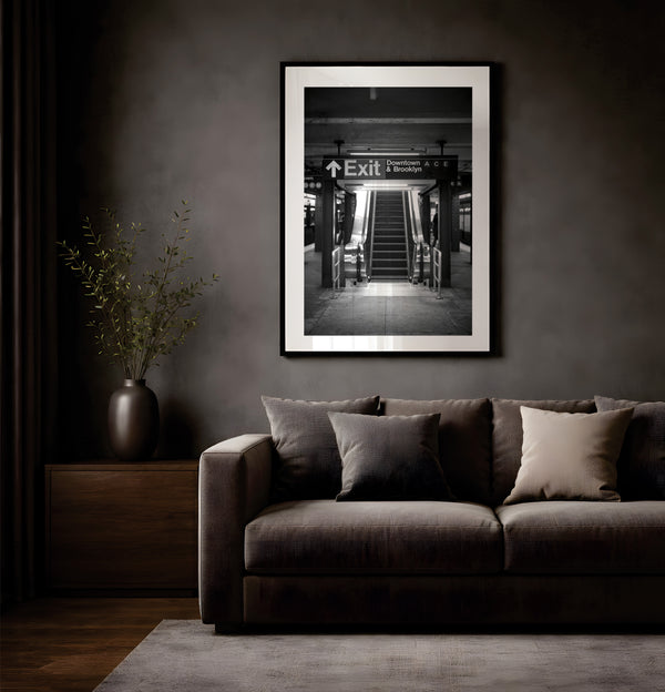NYC Subway ACE Downtown & Brooklyn, Portals Series framed in black above a terracotta velvet sofa, gray plaster wall — Good Beans NYC.