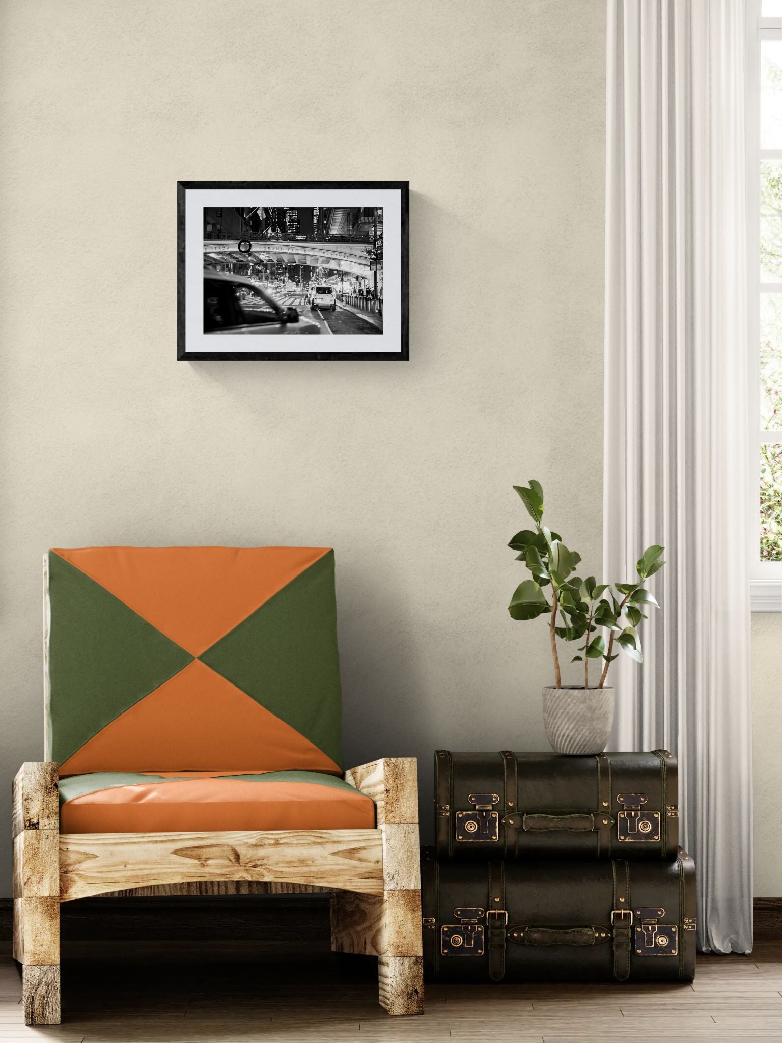 NYC Grand Central at Night, East 42nd Street framed in black above a terracotta velvet sofa, gray plaster wall — Good Beans NYC.