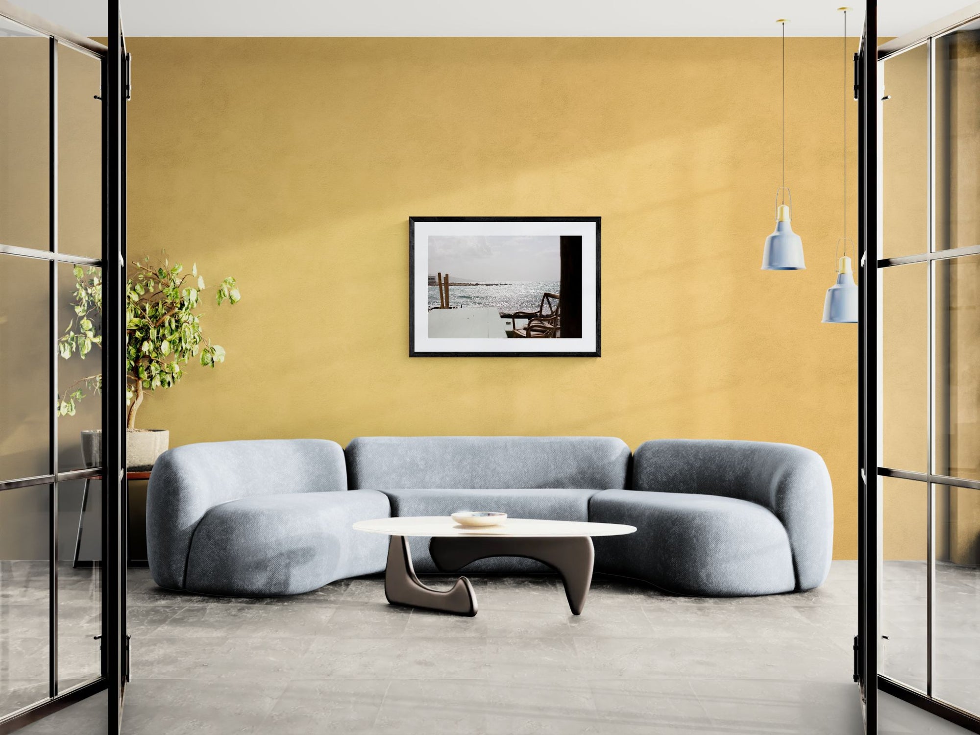 Wing Foiling off the Coast of Byblos, Lebanon framed in black above a terracotta velvet sofa, gray plaster wall — Good Beans NYC.