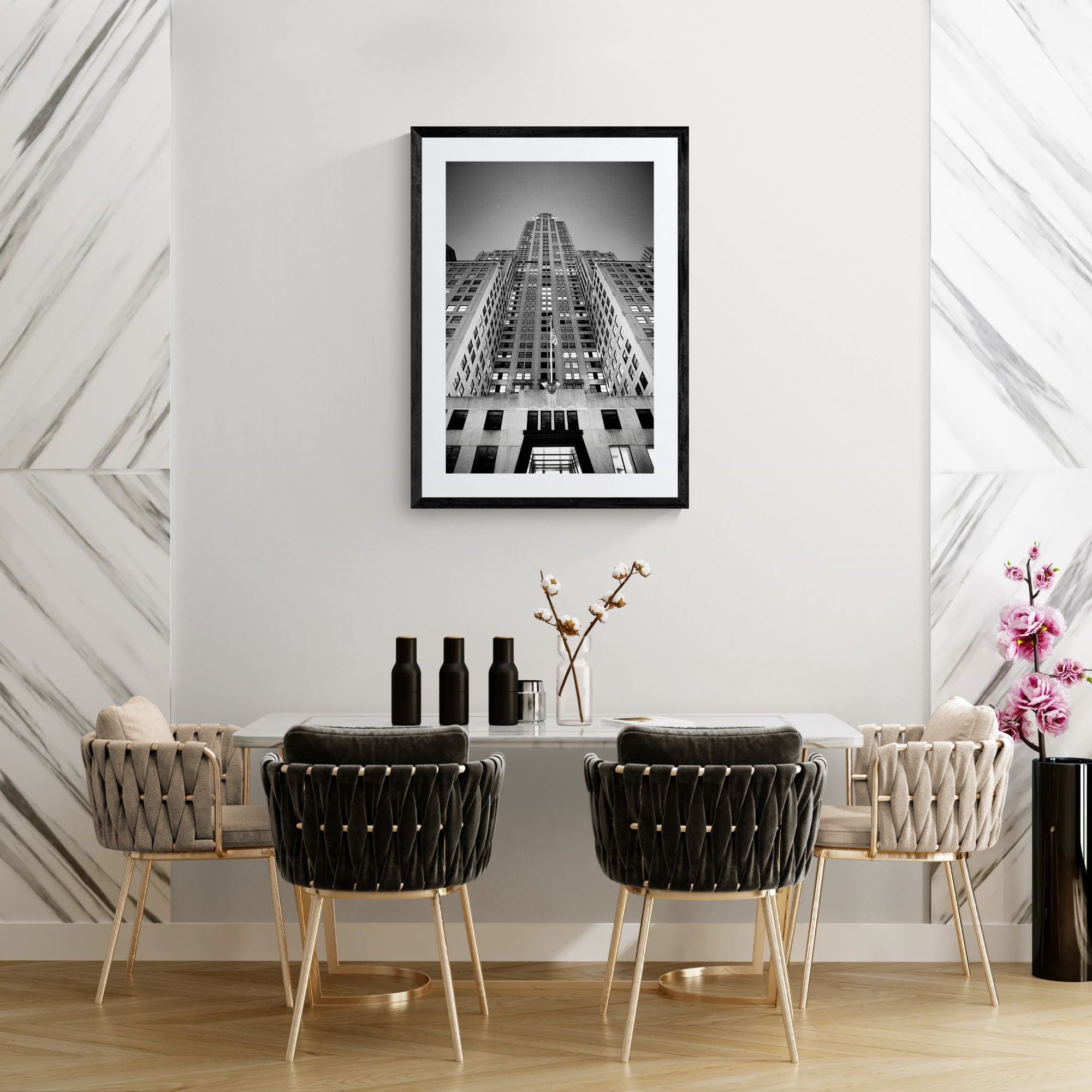 NYC Chrysler Building from Below, Art Deco Crown framed in black on a gallery wall with a side-profile viewer in a dark coat — Good Beans NYC.