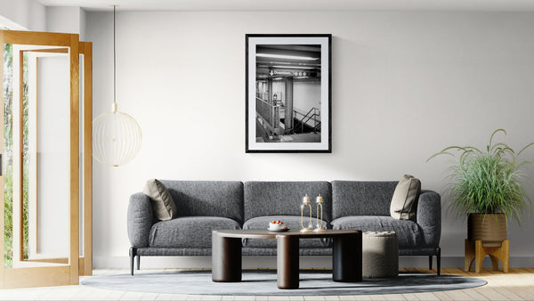 NYC Subway ACBD Uptown & Bronx, Portals Series framed in black on a gallery wall with a side-profile viewer in a dark coat — Good Beans NYC.