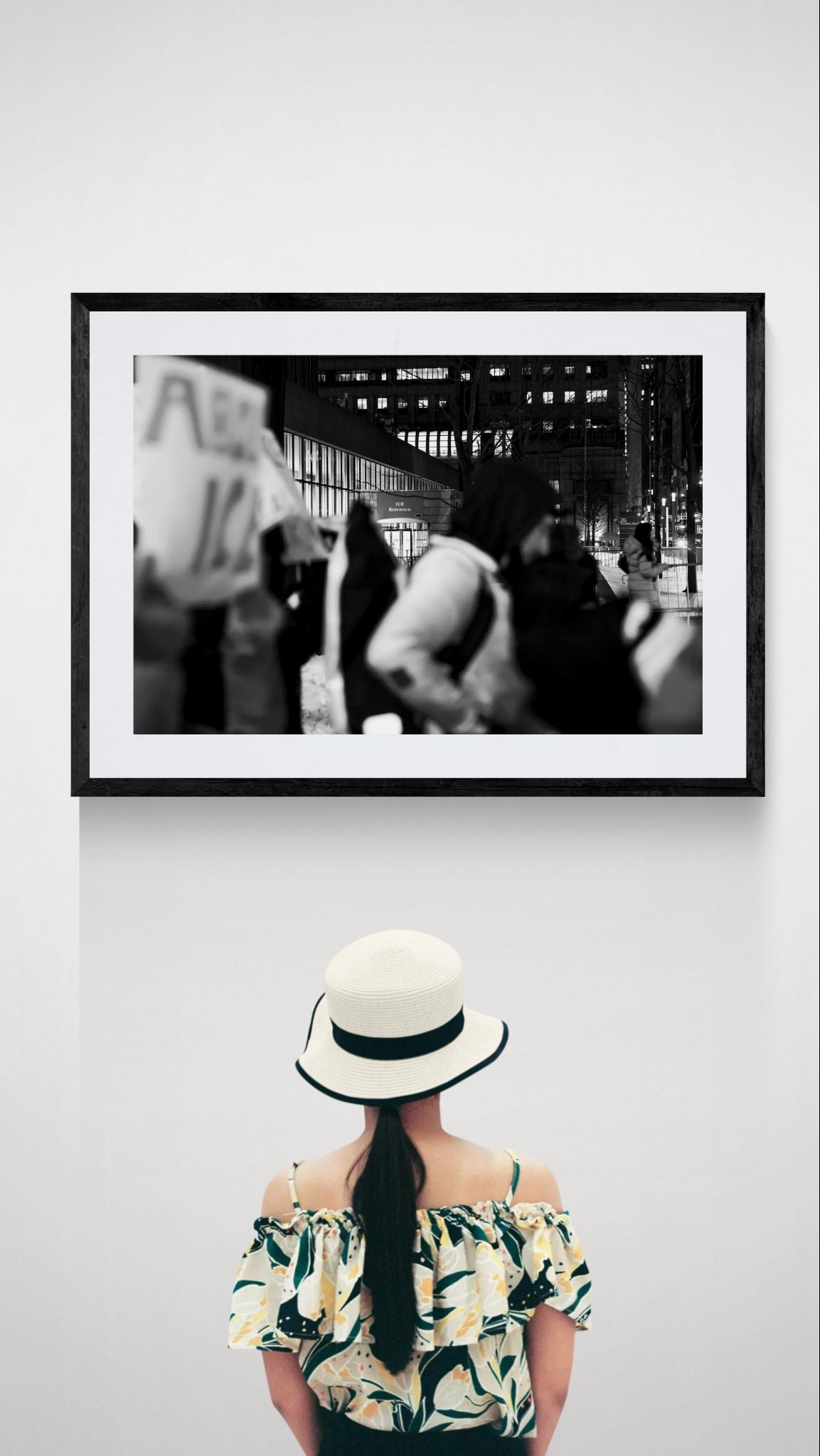 NYC Abolish ICE Entrance, Manhattan framed in black above a terracotta velvet sofa, gray plaster wall — Good Beans NYC.