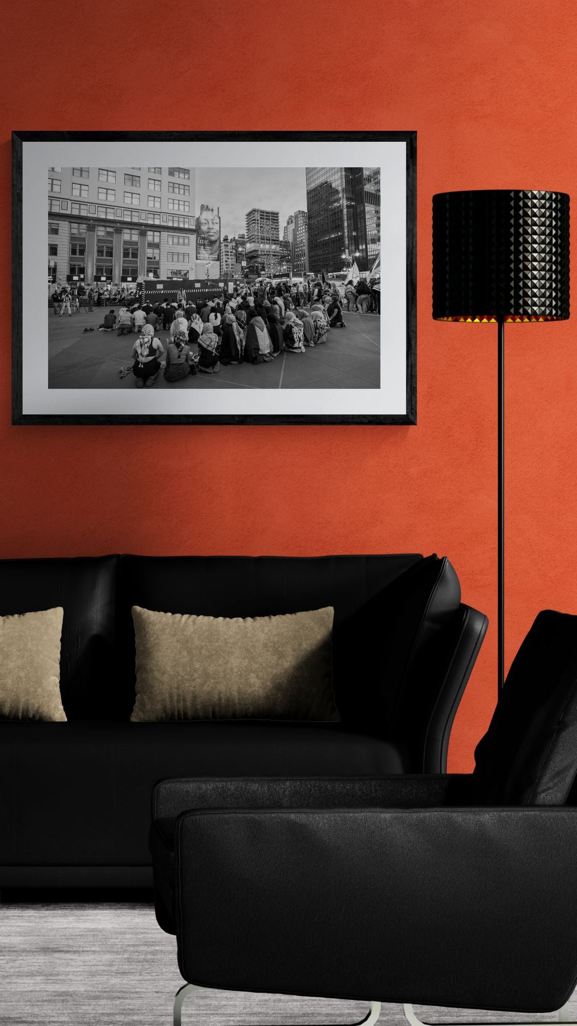 NYC Pro Palestine Prayer #2 framed in black above a beige sofa, sunlit yellow plaster wall — Good Beans NYC.
