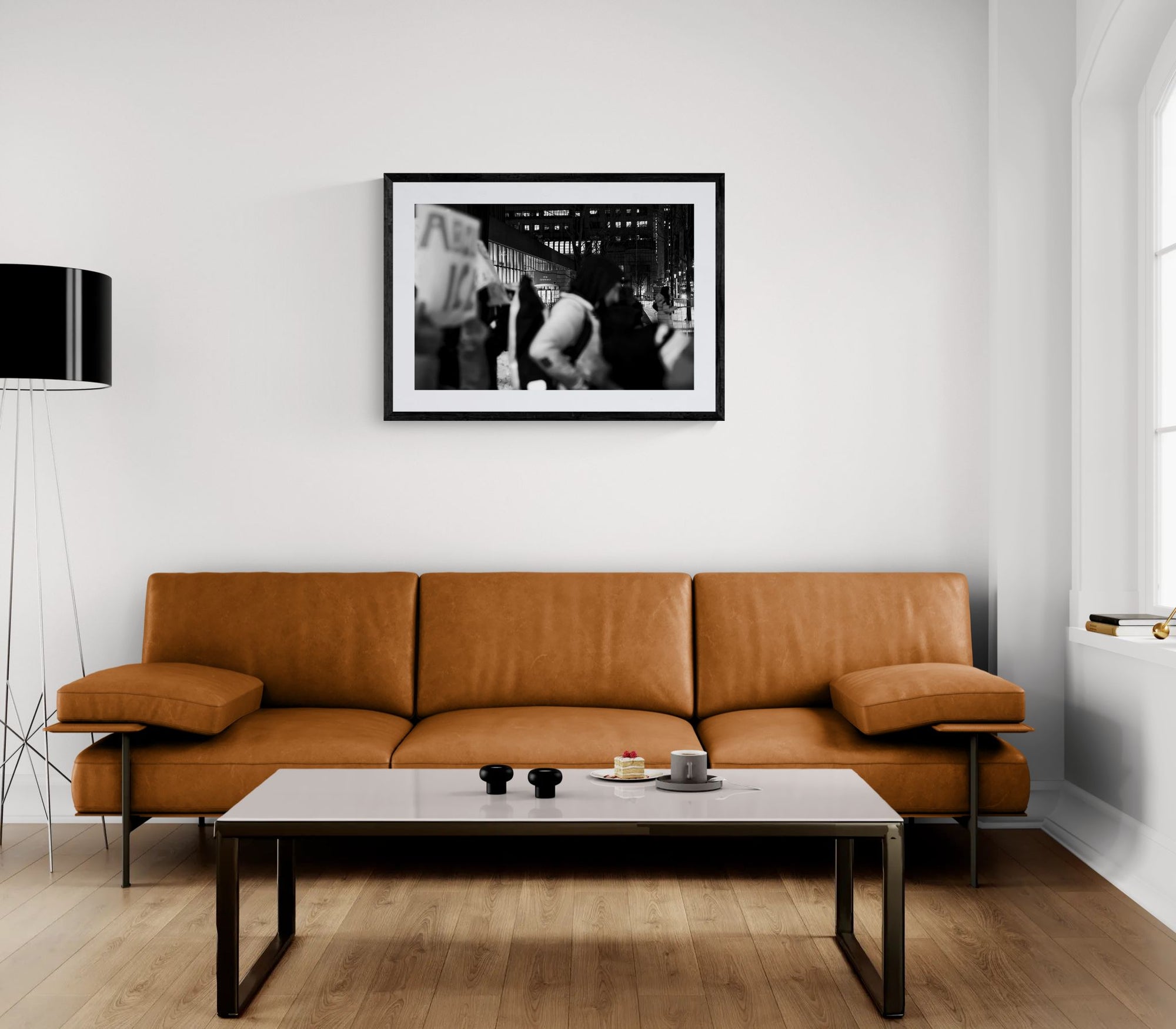 NYC Abolish ICE Entrance, Manhattan framed in black above a beige sofa, sunlit yellow plaster wall — Good Beans NYC.