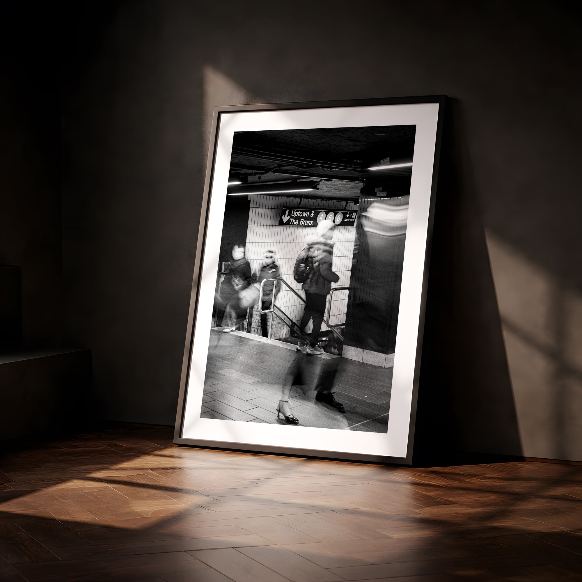 NYC Grand Central Motion, 4 5 6 Uptown framed in black above a terracotta velvet sofa, gray plaster wall — Good Beans NYC.
