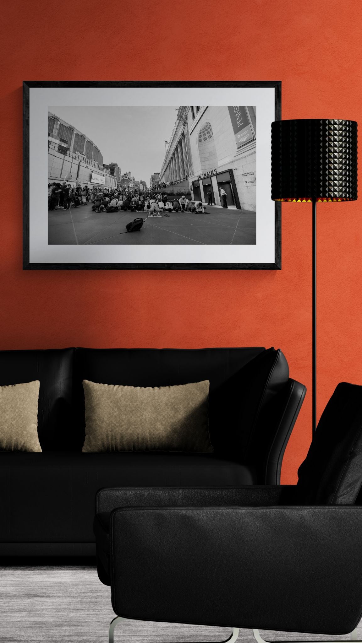 NYC Pro Palestine Prayer at Penn Station framed in black above a terracotta velvet sofa, gray plaster wall — Good Beans NYC.