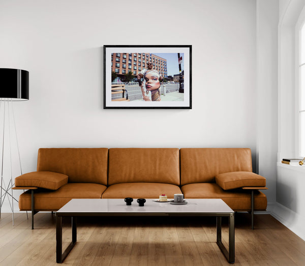 NYC Mermaid Parade Queen Dress, Coney Island framed in black above a terracotta velvet sofa, gray plaster wall — Good Beans NYC.