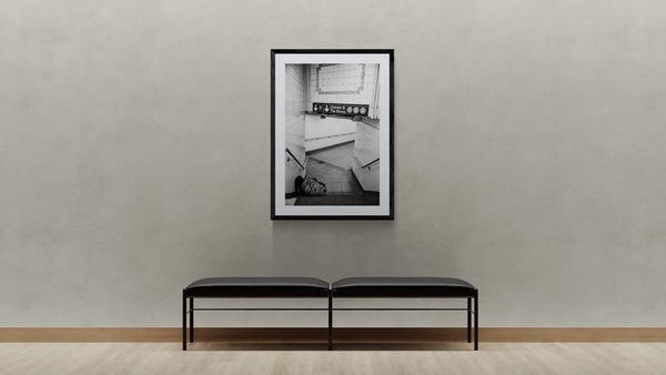 NYC Subway Uptown & Bronx Nap framed in black above a beige sofa, sunlit yellow plaster wall — Good Beans NYC.