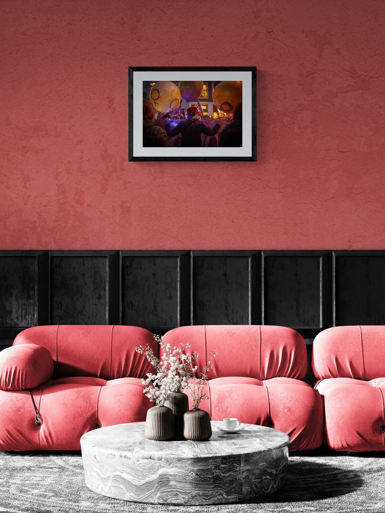 Istanbul Women's March Balloons, Red Hat framed in black above a brown leather sectional, teal wall, gold pendant lamp — Good Beans NYC.