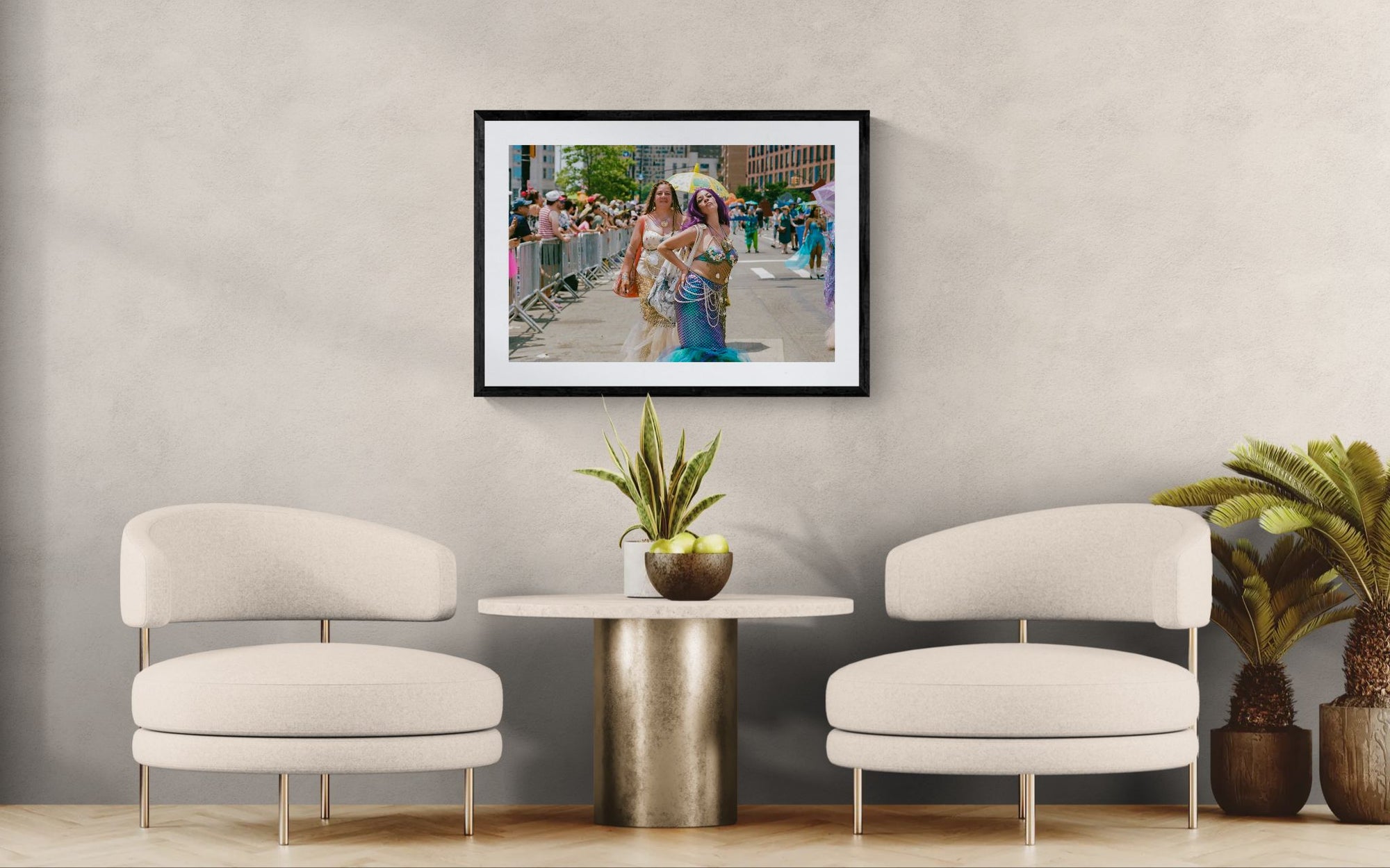 NYC Mermaid Parade Mermaids Posing, Surf Avenue framed in black on a gallery wall with a viewer in a straw hat in front — Good Beans NYC.