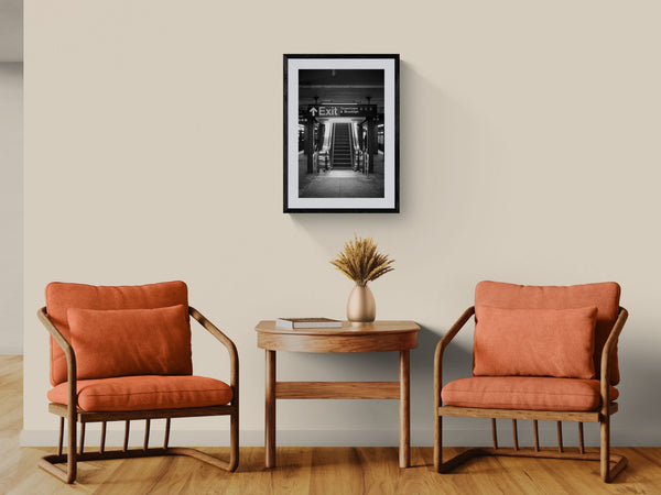NYC Subway ACE Downtown & Brooklyn, Portals Series framed in black on a gallery wall with a side-profile viewer in a dark coat — Good Beans NYC.