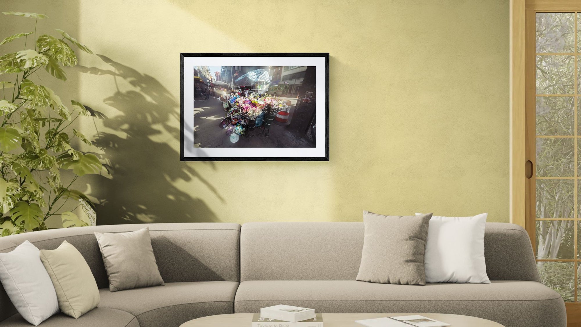 NYC Flower Cart Brooklyn — Under the J Train framed in black above a terracotta velvet sofa, gray plaster wall — Good Beans NYC.