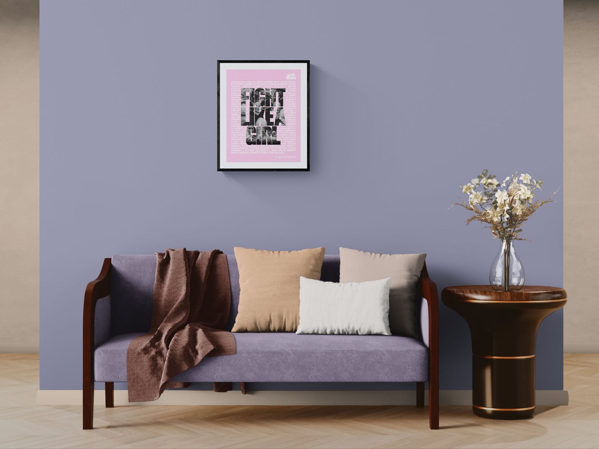 Fight Like a Girl Poster, Plaza de Mayo framed in black above a terracotta velvet sofa, gray plaster wall — Good Beans NYC.