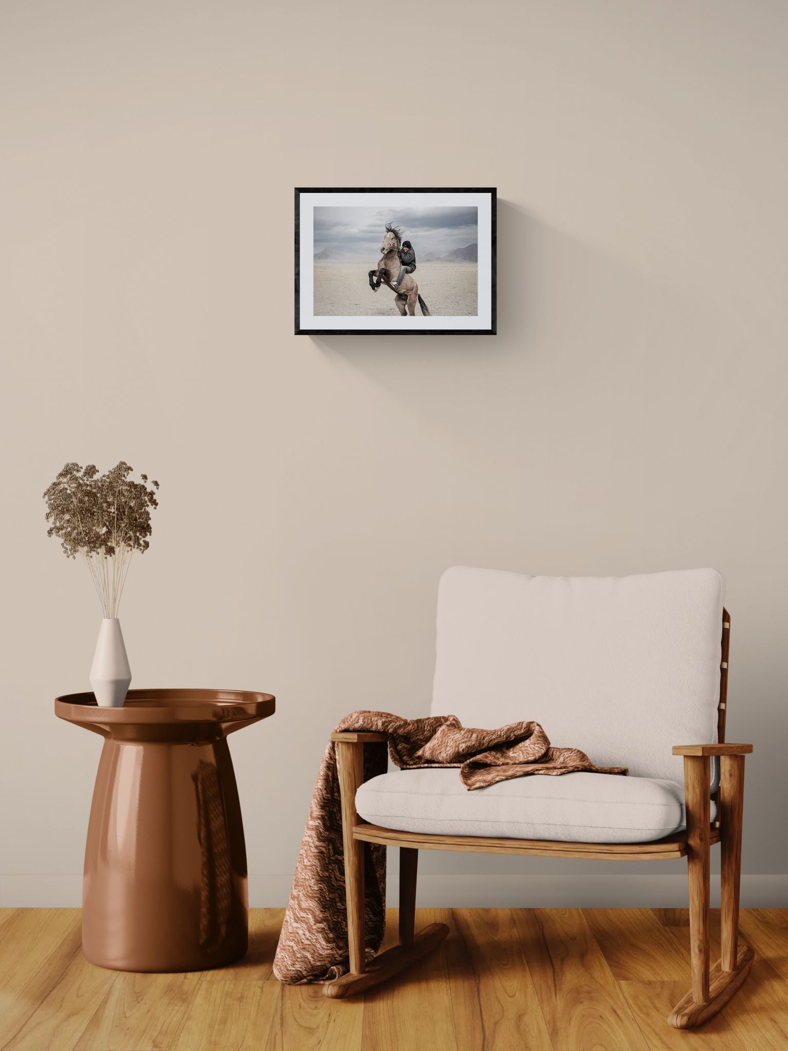 Mongolian Horse Rider, Bayan-Ölgii framed in black on a gallery wall with a side-profile viewer in a dark coat — Good Beans NYC.