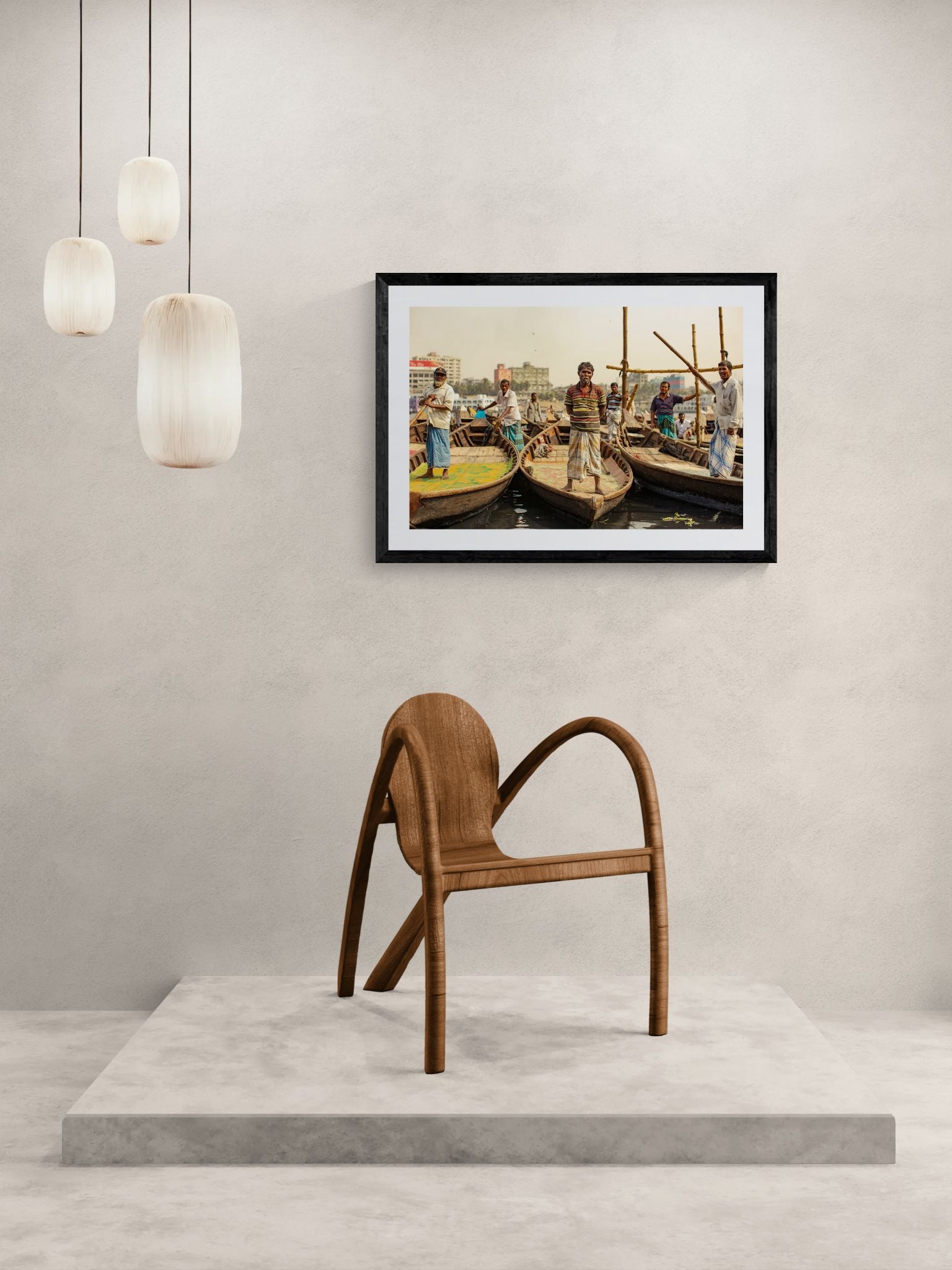 Dhaka Boat Men, Buriganga River framed in black above a terracotta velvet sofa, gray plaster wall — Good Beans NYC.